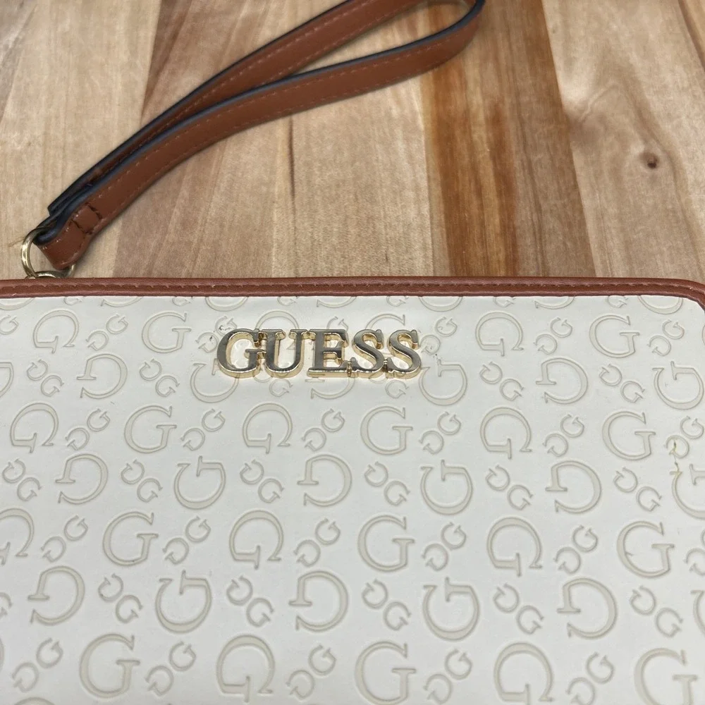 GUESS Beige With Brown Trim Embossed Wristlet‎ Wallet